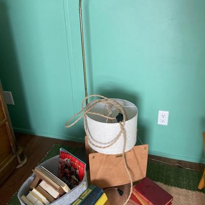 Books, reading lamp and hanging light.