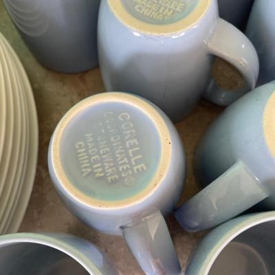 White plates Blue mugs champagne flutes. I