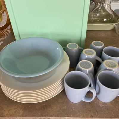 White plates Blue mugs champagne flutes. I
