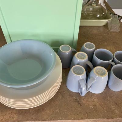 White plates Blue mugs champagne flutes. I