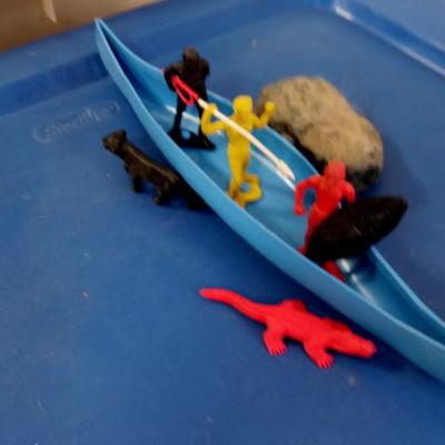 LOT 73 MULTIPLE TOYS BOAT WITH NATIVES AND ANIMALS