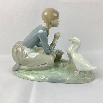 Lot 576 Vintage LLADRO, Retired Gloss Porcelain Figurine, made in Spain, â€œ Food for Ducks â€œ