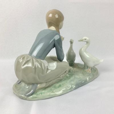 Lot 576 Vintage LLADRO, Retired Gloss Porcelain Figurine, made in Spain, â€œ Food for Ducks â€œ