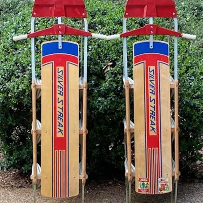 Two Vintage Silver Streak Sleds