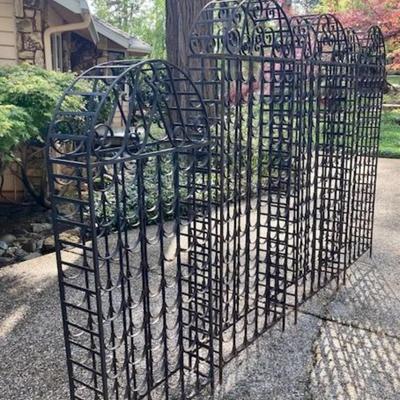 Four Black Metal Wine Racks