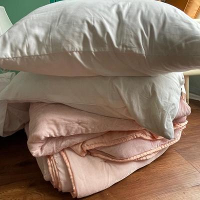 Two twin comforters and pillows
