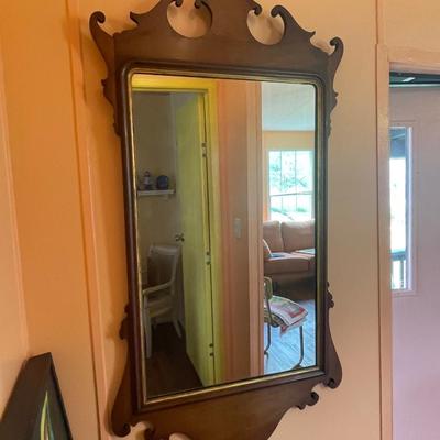 Antique mahogany scrolled mirror