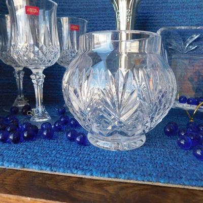 BEAUTIFUL ASSORTMENT OF LEAD CRYSTAL ITEMS, SOME BLUE MARBLES AND A TOUCH OF SILVER PLATE