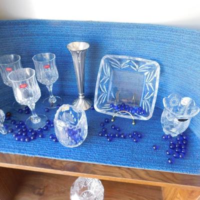 BEAUTIFUL ASSORTMENT OF LEAD CRYSTAL ITEMS, SOME BLUE MARBLES AND A TOUCH OF SILVER PLATE