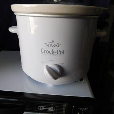 NEW RIVAL CROCKPOT AND TRAVEL CASE, SLOW COOKER REVOLUTION COOKBOOK AND NICE LITTLE PRIMO  TOASTER OVEN