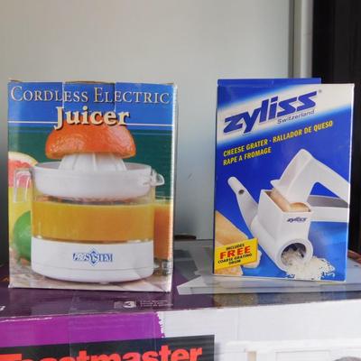 MR. COFFEE FOOD DEHYDRATOR, TOASTMASTER DELI SLICER, ZYLISS CHEESE GRATER, AND CORDLESS JUICER
