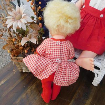 VINTAGE DOLLY'S IN RED AND ACCESSORIZING ITEMS OF DECOR