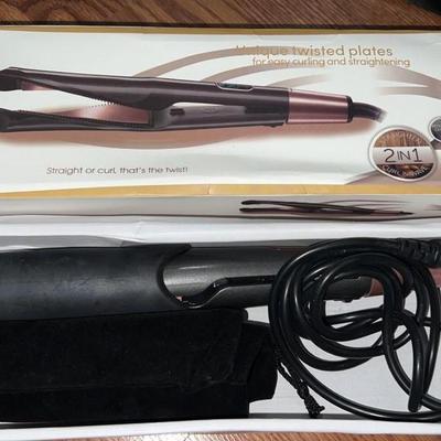 curling iron / straightener with twisted blades