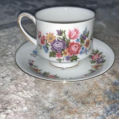 CUP SAUCER PARAGON BY APPOINTMENT TO HER MAJESTY THE QUEEN. Floral w gold trim