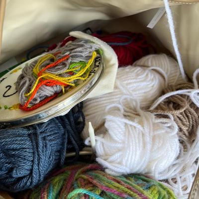 Sewing basket with yarn & notions.