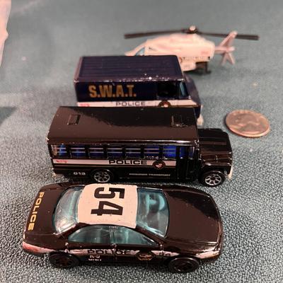 4 COUNT MATTEL HOT WHEELS POLICE SWAT VEHICLES