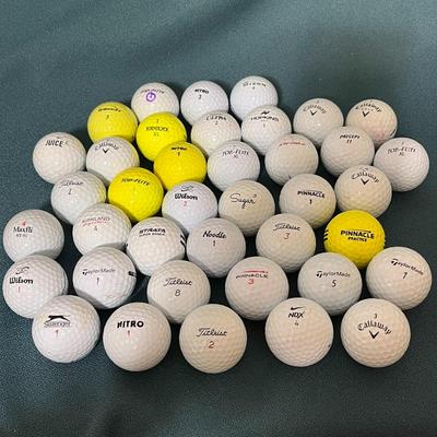 GOLF BALLS 39 COUNT MOSTLY NEW OR NEARLY NEW