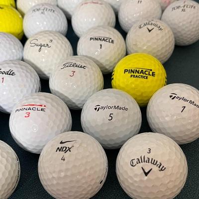 GOLF BALLS 39 COUNT MOSTLY NEW OR NEARLY NEW