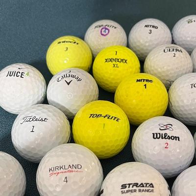 GOLF BALLS 39 COUNT MOSTLY NEW OR NEARLY NEW