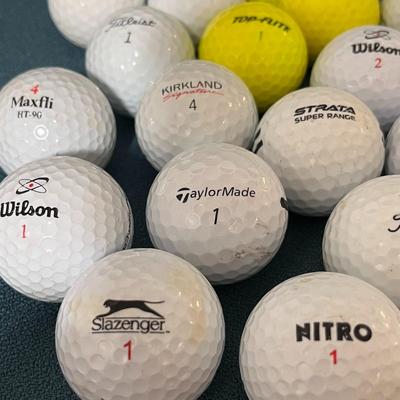 GOLF BALLS 39 COUNT MOSTLY NEW OR NEARLY NEW