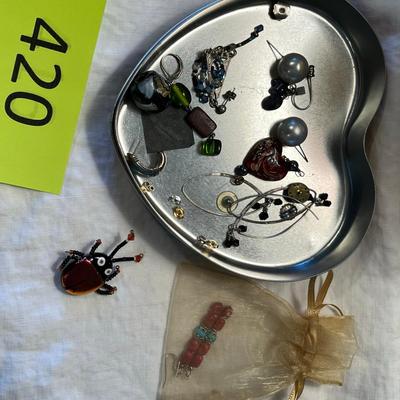 Tin with earrings