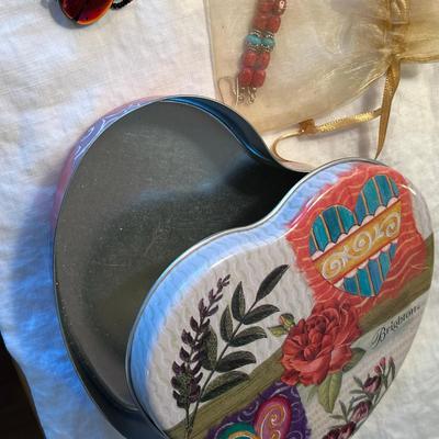 Tin with earrings