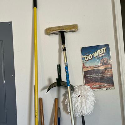 Lot of brooms & other