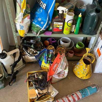 Lot of lawn care items.
