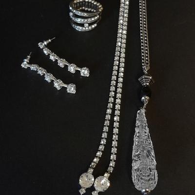 Necklace, Earrings, and a ring with an elastic band BLING!