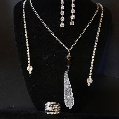 Necklace, Earrings, and a ring with an elastic band BLING!