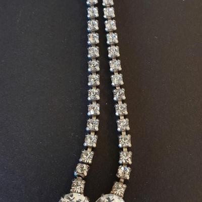 Necklace, Earrings, and a ring with an elastic band BLING!