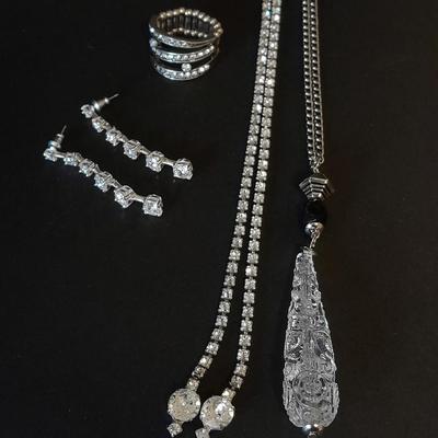 Necklace, Earrings, and a ring with an elastic band BLING!