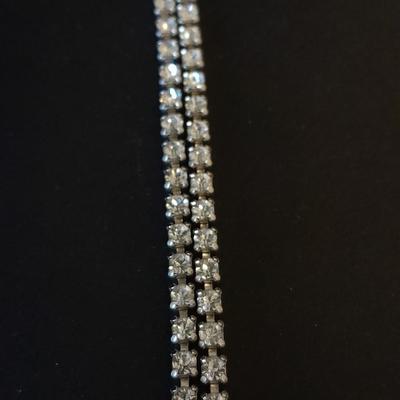 Necklace, Earrings, and a ring with an elastic band BLING!