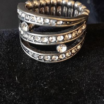 Necklace, Earrings, and a ring with an elastic band BLING!