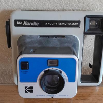 The Handle Kodak instant Camera with booklets Polaroid