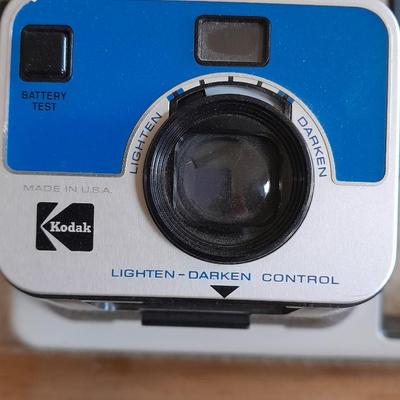 The Handle Kodak instant Camera with booklets Polaroid