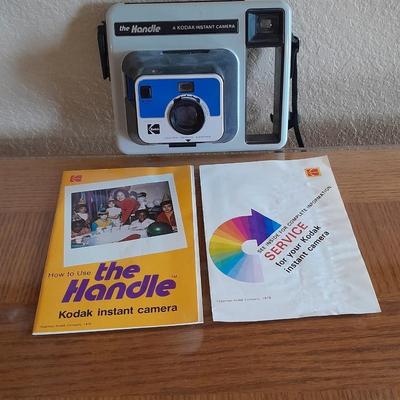 The Handle Kodak instant Camera with booklets Polaroid