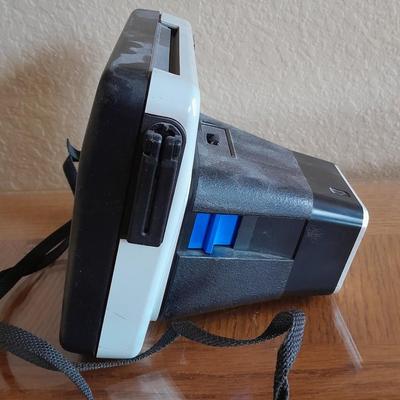 The Handle Kodak instant Camera with booklets Polaroid