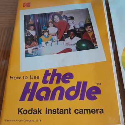 The Handle Kodak instant Camera with booklets Polaroid