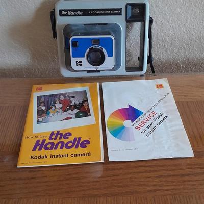 The Handle Kodak instant Camera with booklets Polaroid