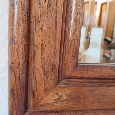Large wood framed beveled glass mirror