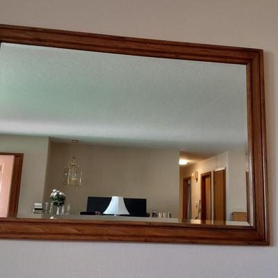 Large wood framed beveled glass mirror