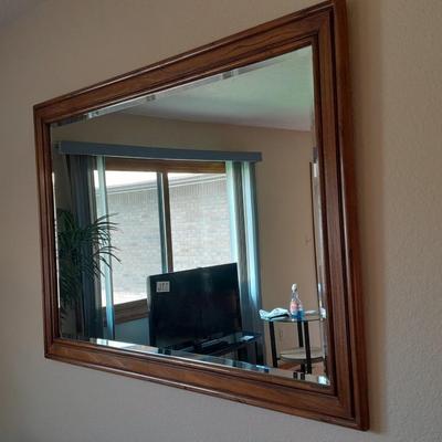 Large wood framed beveled glass mirror