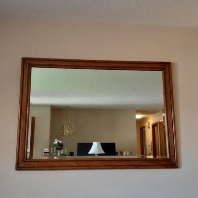 Large wood framed beveled glass mirror