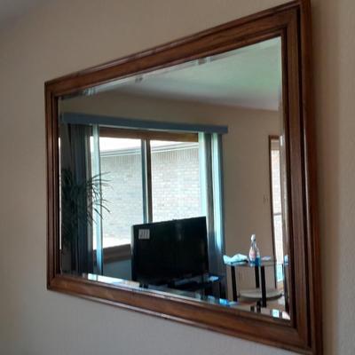 Large wood framed beveled glass mirror