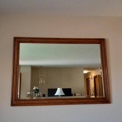 Large wood framed beveled glass mirror