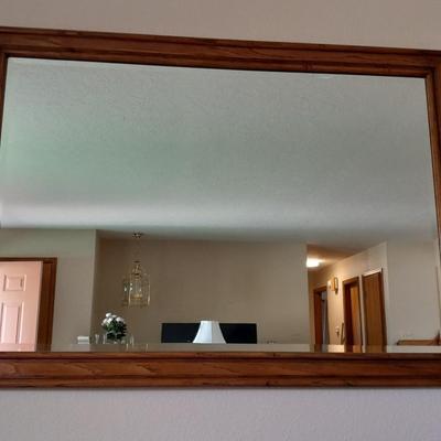Large wood framed beveled glass mirror