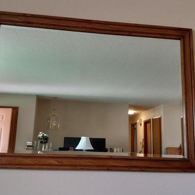 Large wood framed beveled glass mirror