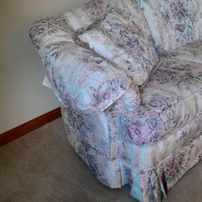Beautiful Broyhill floral sofa with throw pillows and arm protectors