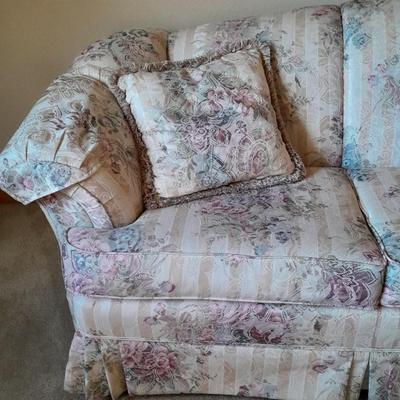 Beautiful Broyhill floral sofa with throw pillows and arm protectors
